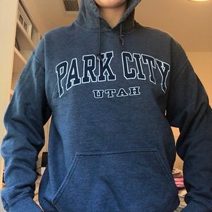 park city sweatshirt and has hood, and pocket